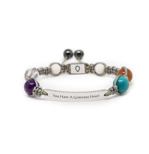 Handmade bracelet with natural stones combine with a silver nameplate, lava beads and silver closure