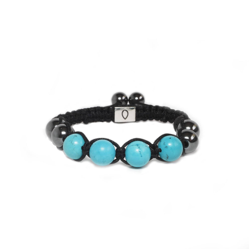 
            
                Load image into Gallery viewer, Handmade bracelet with 4 turquoise beads and hematite in black cording
            
        