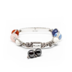 Healing crystal wish bracelet with natural stones and a silver-platinum closure with our logo on it